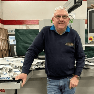 business owner nigel in the boston trade frames factory