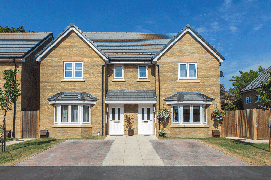 white upvc windows on the front of two semi-detached modern homes